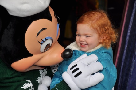 V meeting Minnie Mouse on Disneyland trip #2, December 2011.